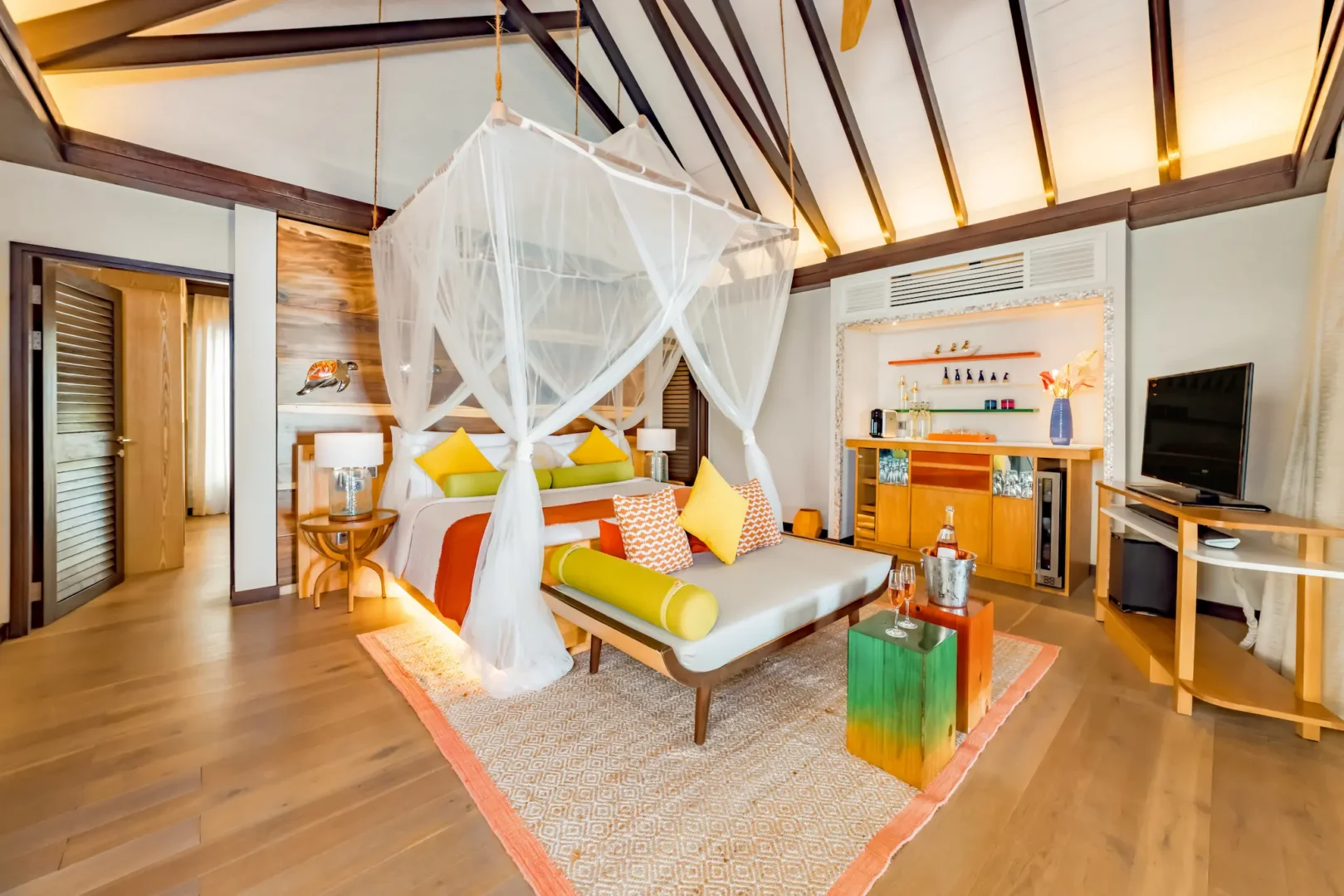Master bedroom and living room in an Earth Pool Pavilion at OZEN LIFE MAADHOO, featuring spacious contemporary interiors, separate living areas and family-friendly accommodation