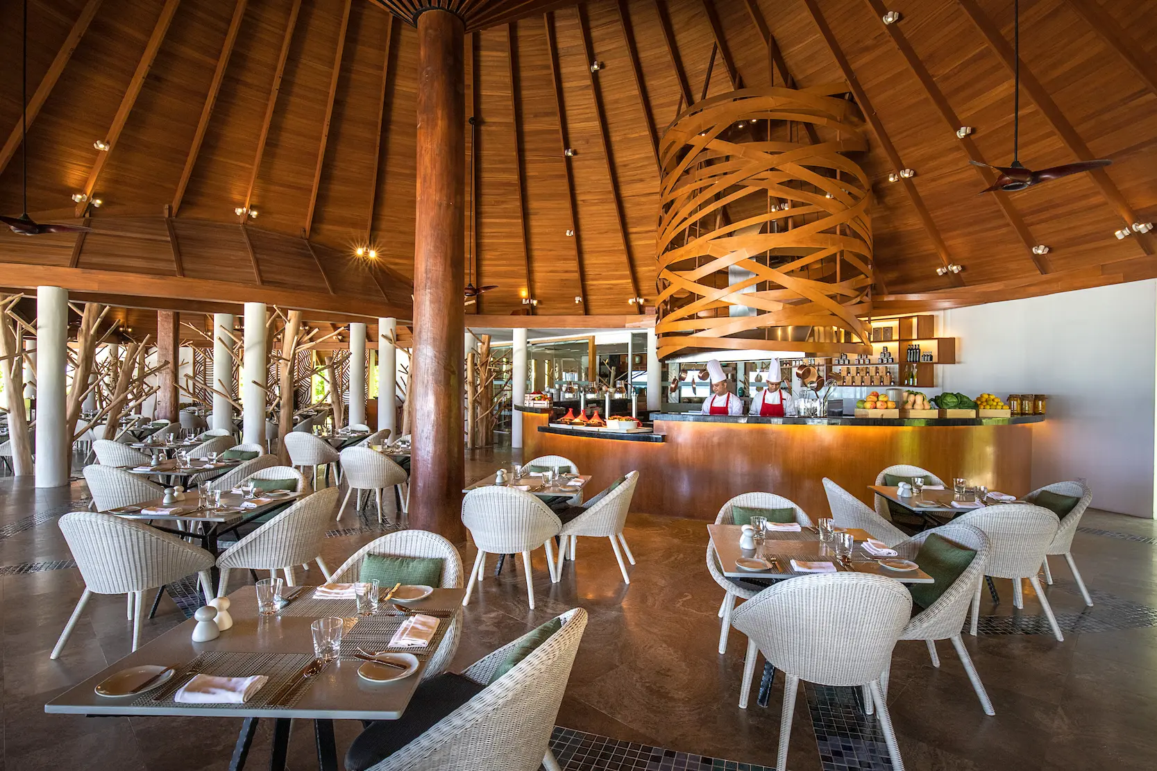 Interior dining area at The Palms restaurant at OZEN LIFE MAADHOO, offering all-day dining with ocean views and a selection of international cuisine