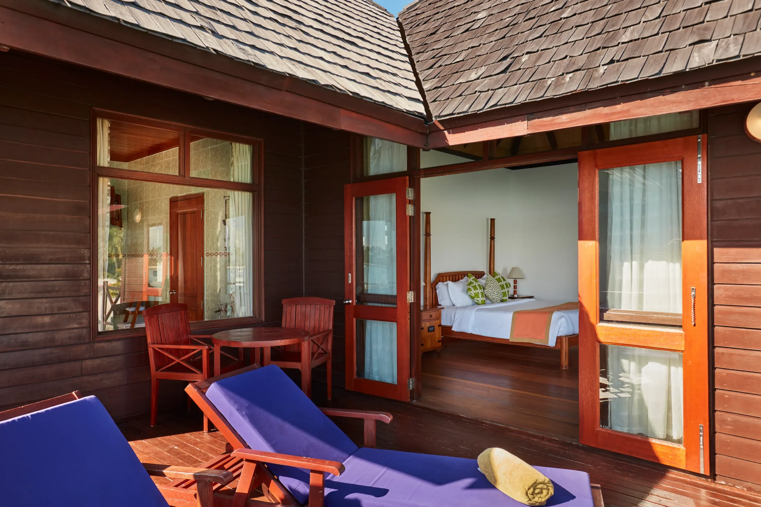 interior view from the deck of a water villa at sun siyam olhuveli maldives overlooking the lagoon