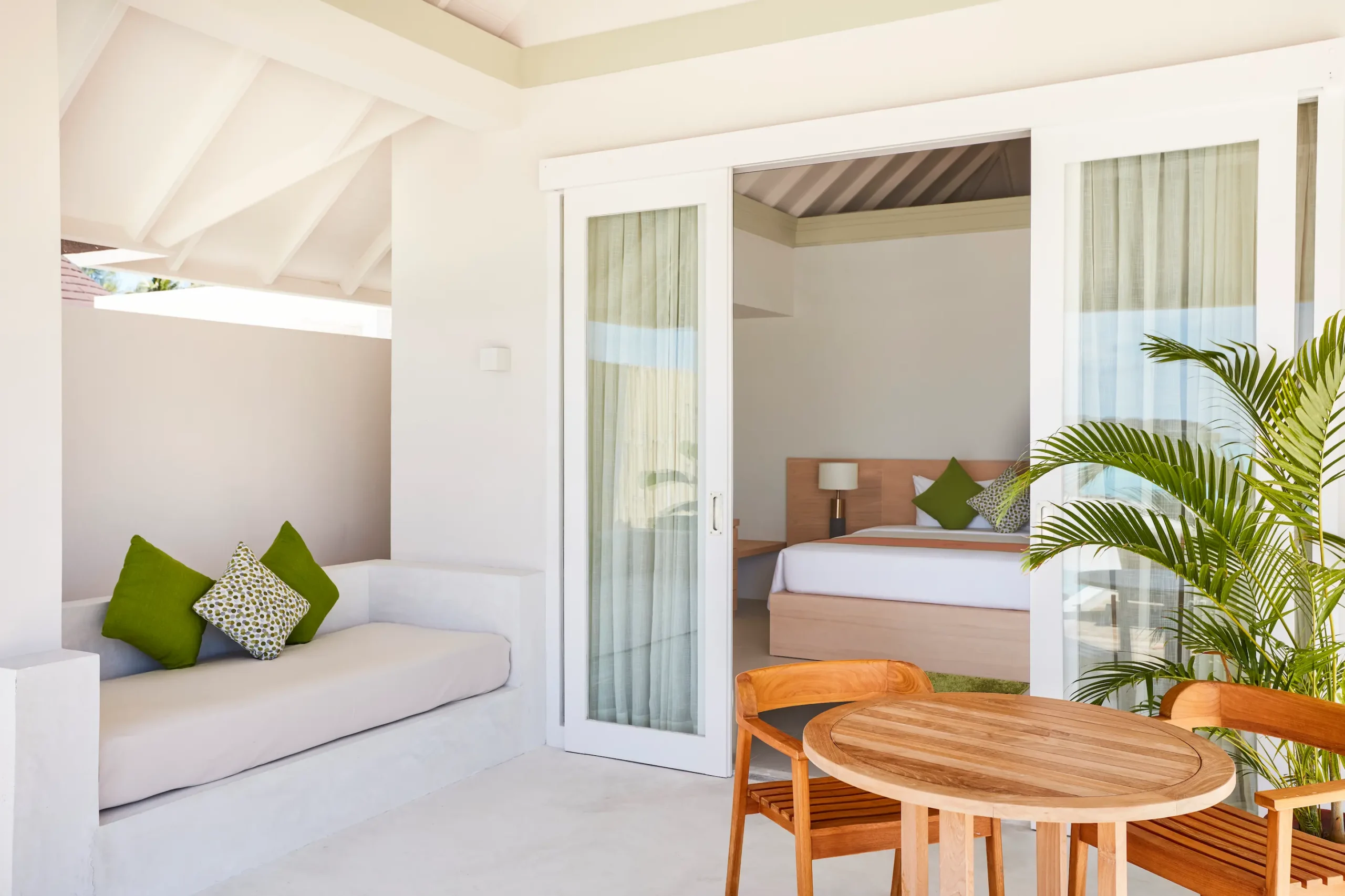 outdoor seating area at a grand beach villa with pool at sun siyam olhuveli maldives