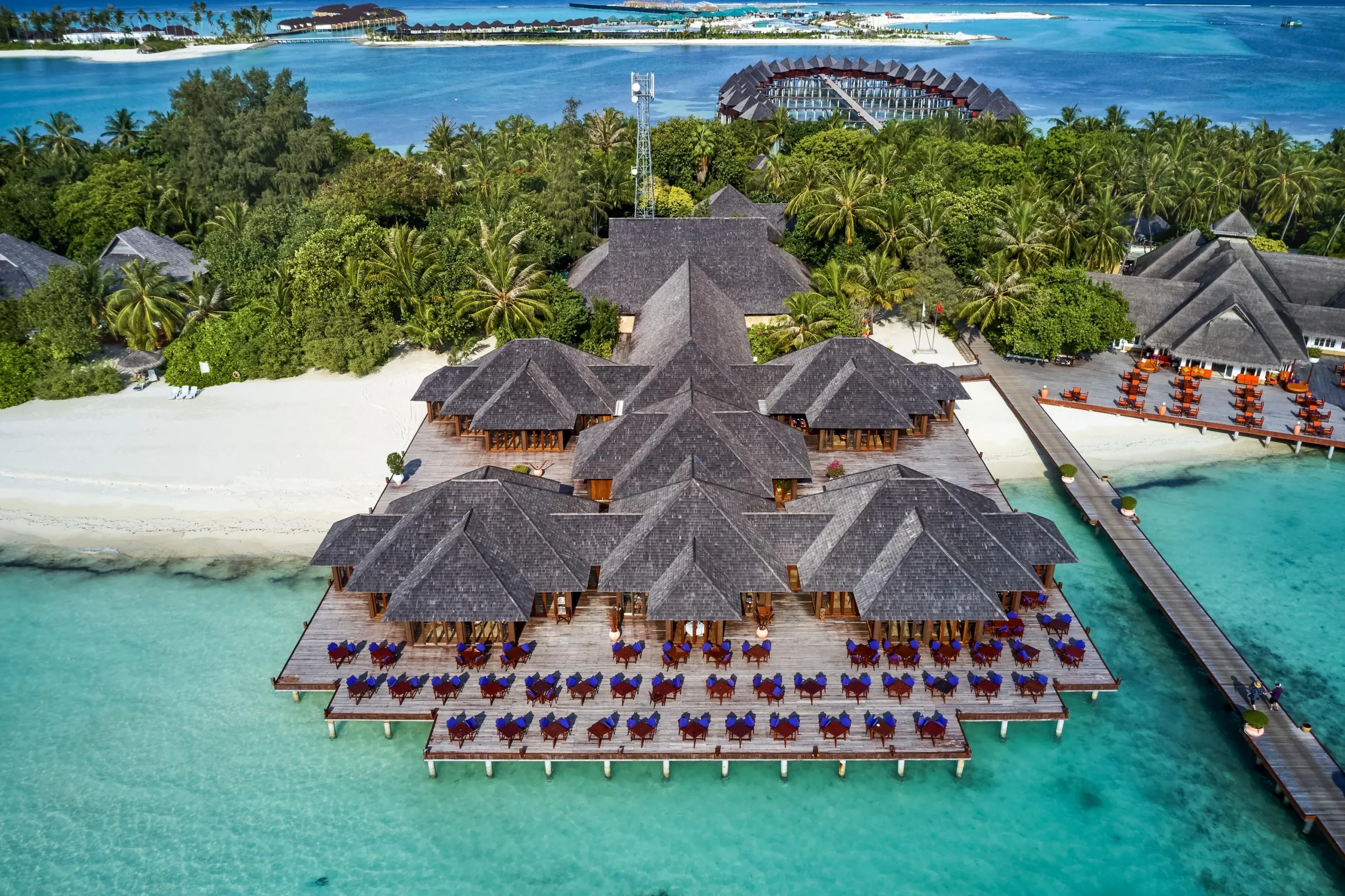 sunset restaurant at sun siyam olhuveli maldives offering all day dining beside the beach and lagoon