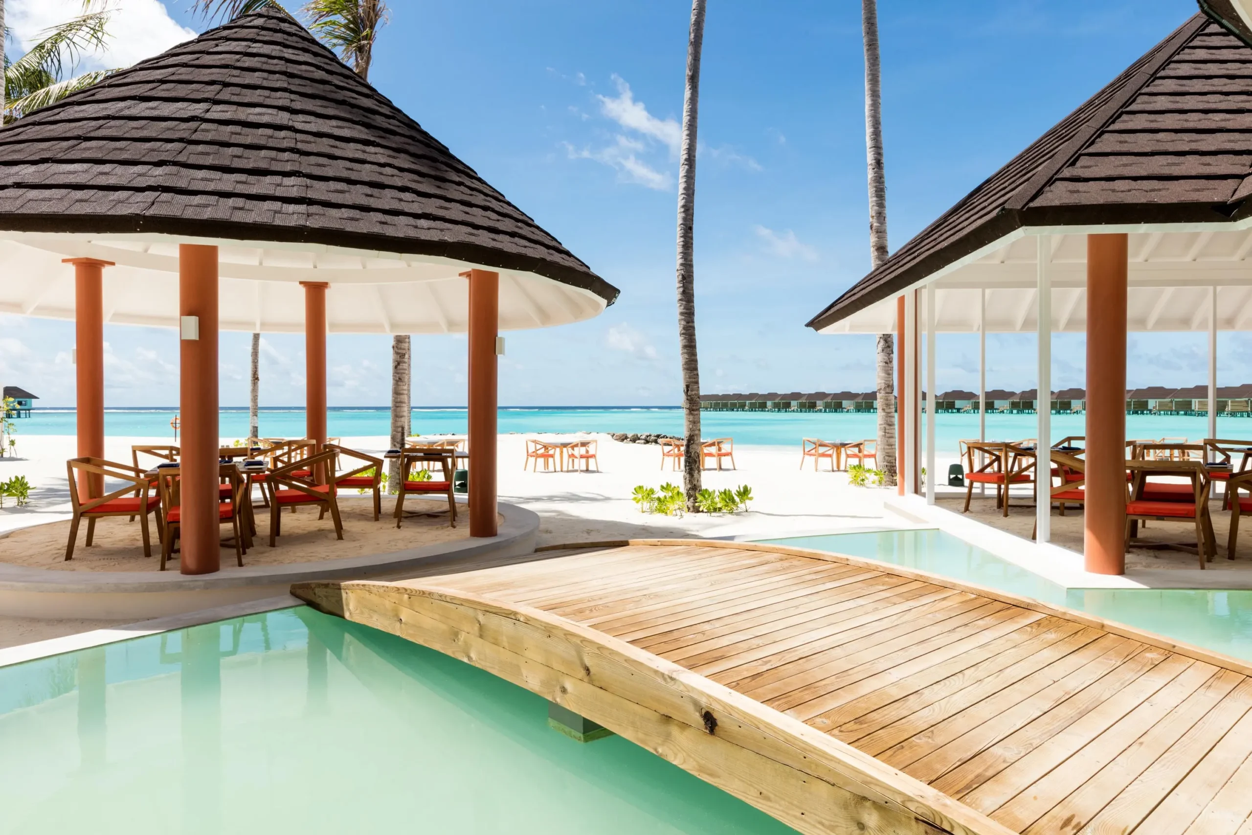 maghrib grill at sun siyam olhuveli maldives offering beachfront surf and turf dining with ocean views