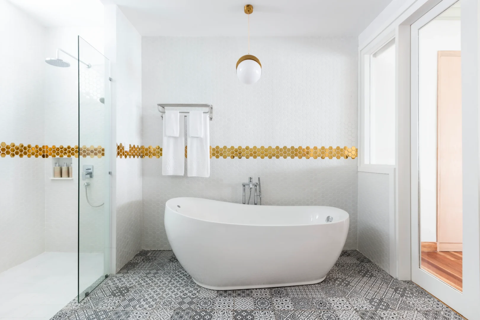 bathtub in a grand water villa with pool at sun siyam olhuveli maldives featuring contemporary bathroom design