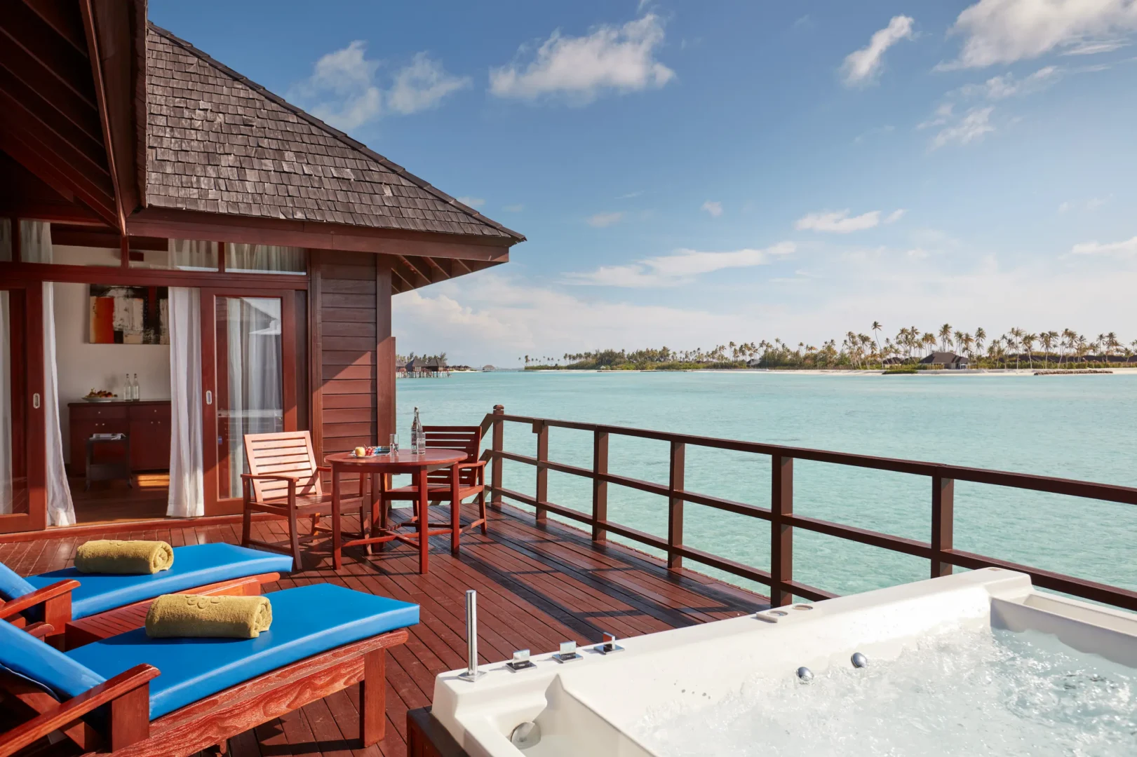 private jacuzzi on the terrace of a prestige jacuzzi water villa at sun siyam olhuveli maldives above the lagoon
