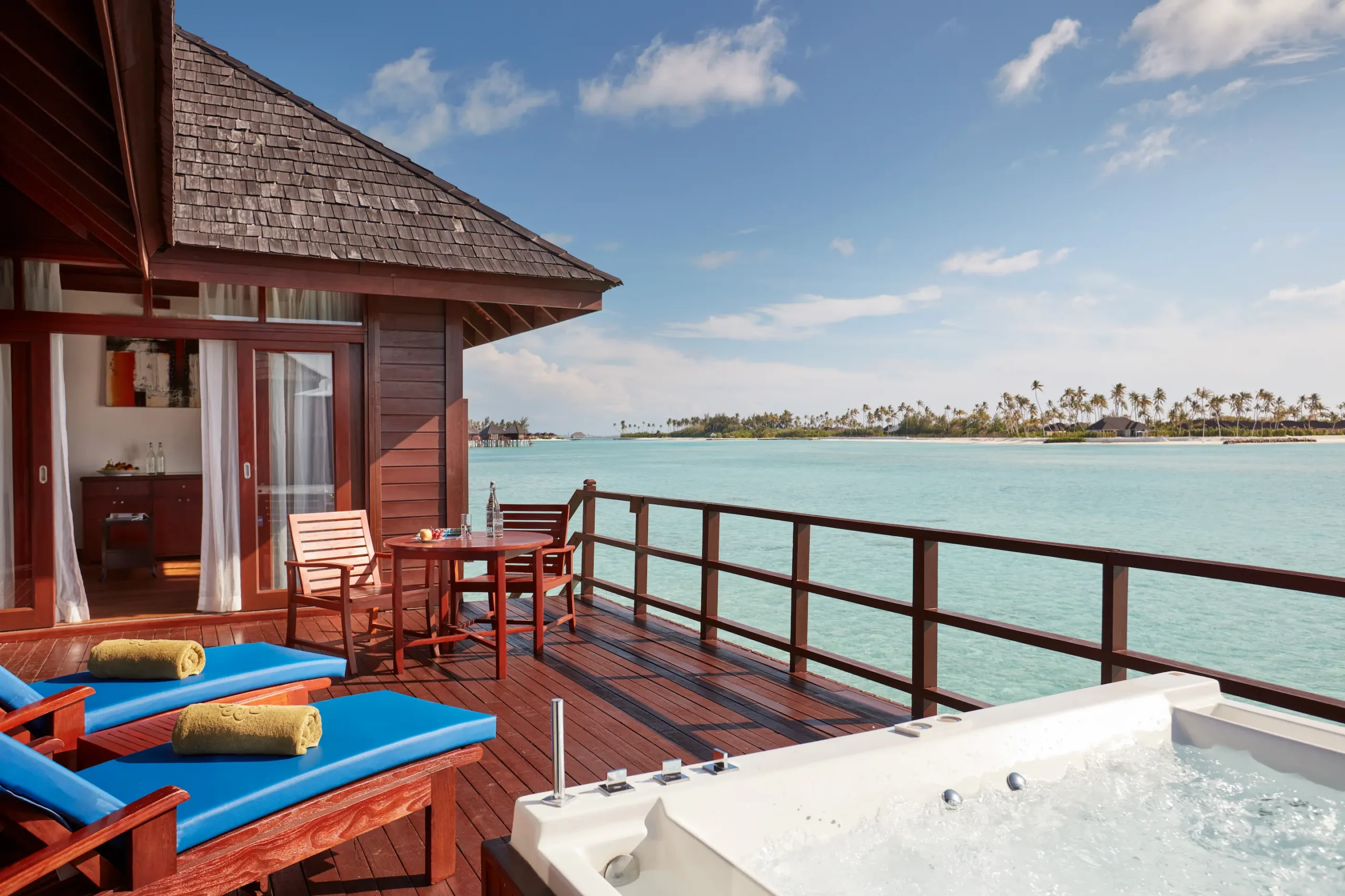 private jacuzzi on the terrace of a prestige jacuzzi water villa at sun siyam olhuveli maldives above the lagoon