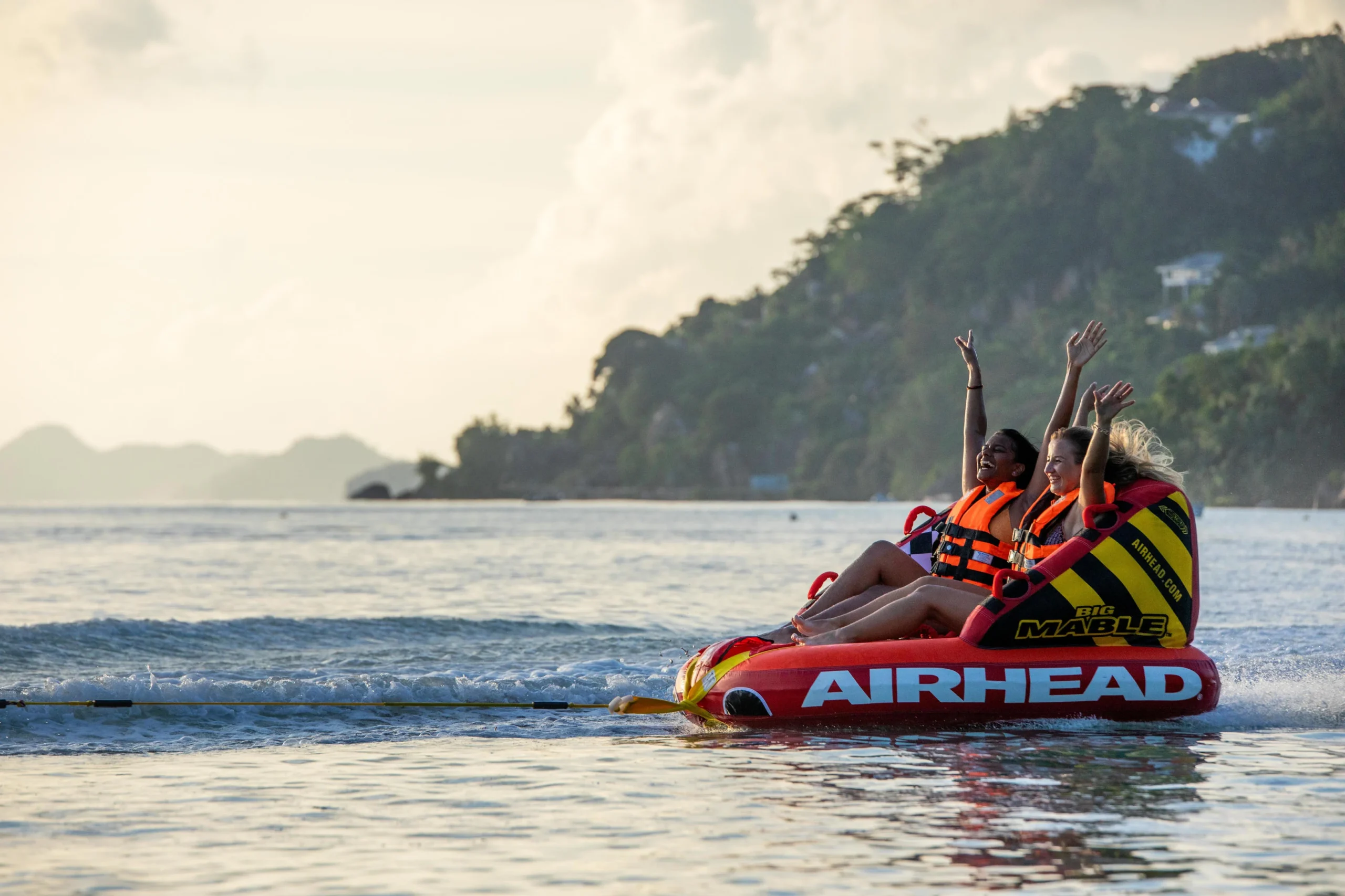 Water sport activities at Canopy by Hilton Seychelles Resort in Mahé, Seychelles, taking place along the shores of Anse La Mouche.