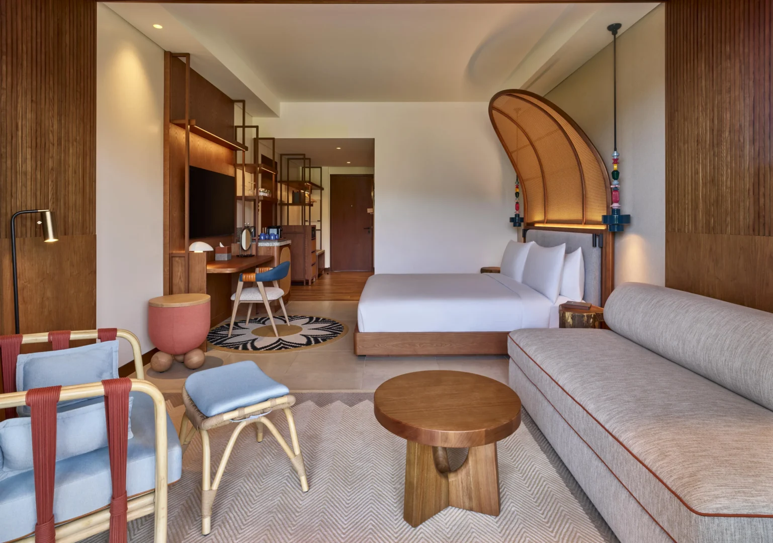 Deluxe Room with Pool View at Canopy by Hilton Seychelles Resort in Mahé, Seychelles, offering spacious accommodation, contemporary island-inspired décor and views across the resort swimming pool.