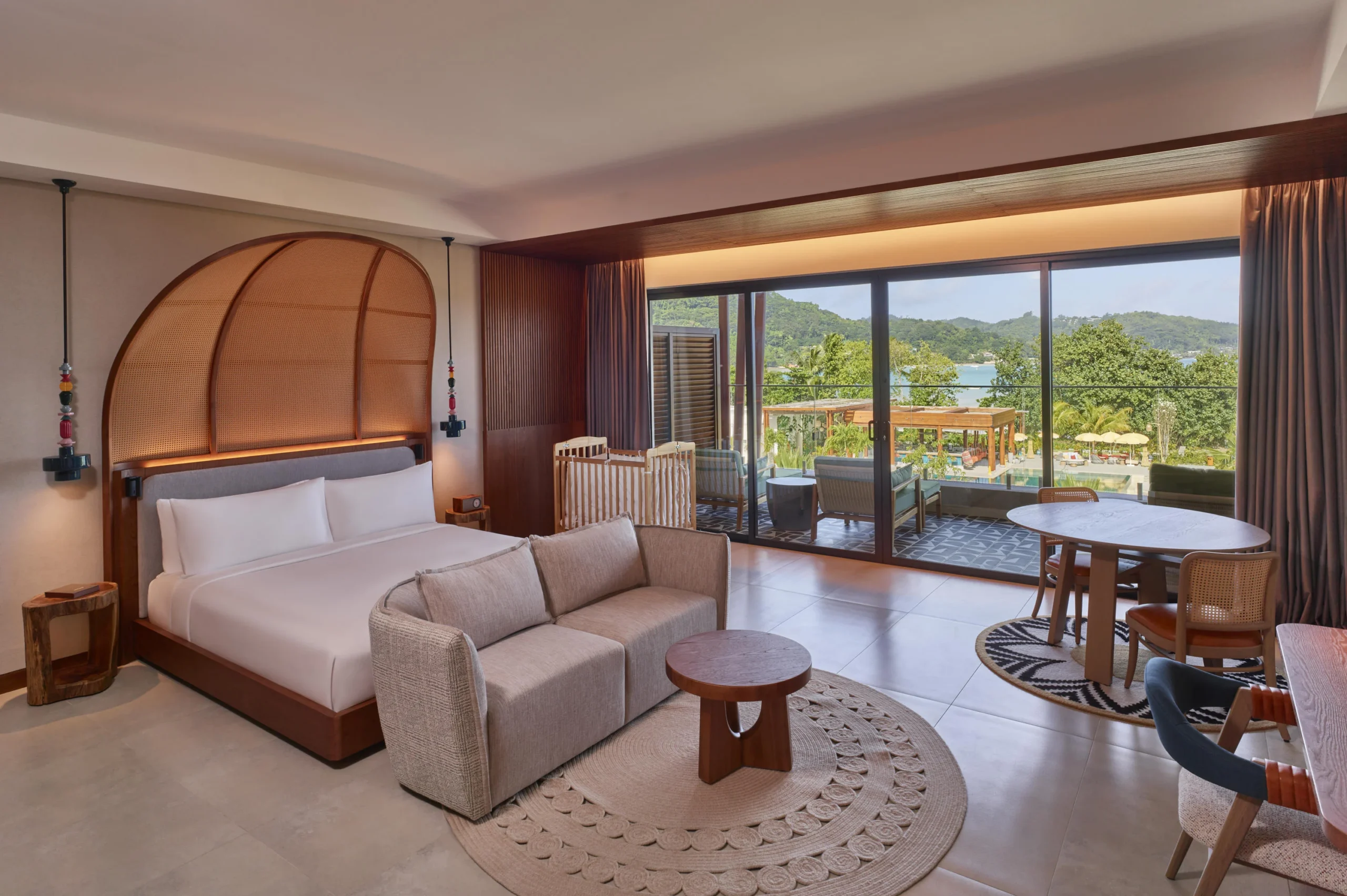 Junior Suite at Canopy by Hilton Seychelles Resort in Mahé, Seychelles, offering spacious open-plan accommodation, contemporary island-inspired décor and a private balcony with tropical views.