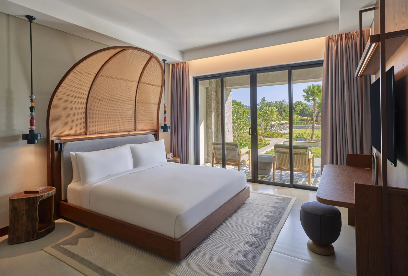 Room with Garden View at Canopy by Hilton Seychelles Resort in Mahé, Seychelles, featuring a private balcony overlooking the gardens.
