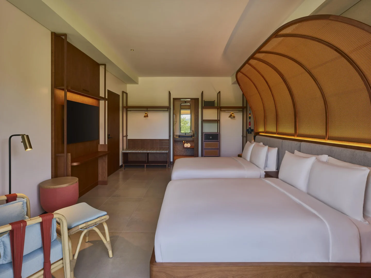 Interior of the Family Connecting Room at Canopy by Hilton Seychelles Resort in Mahé, Seychelles, featuring interconnected accommodation designed for families and groups.
