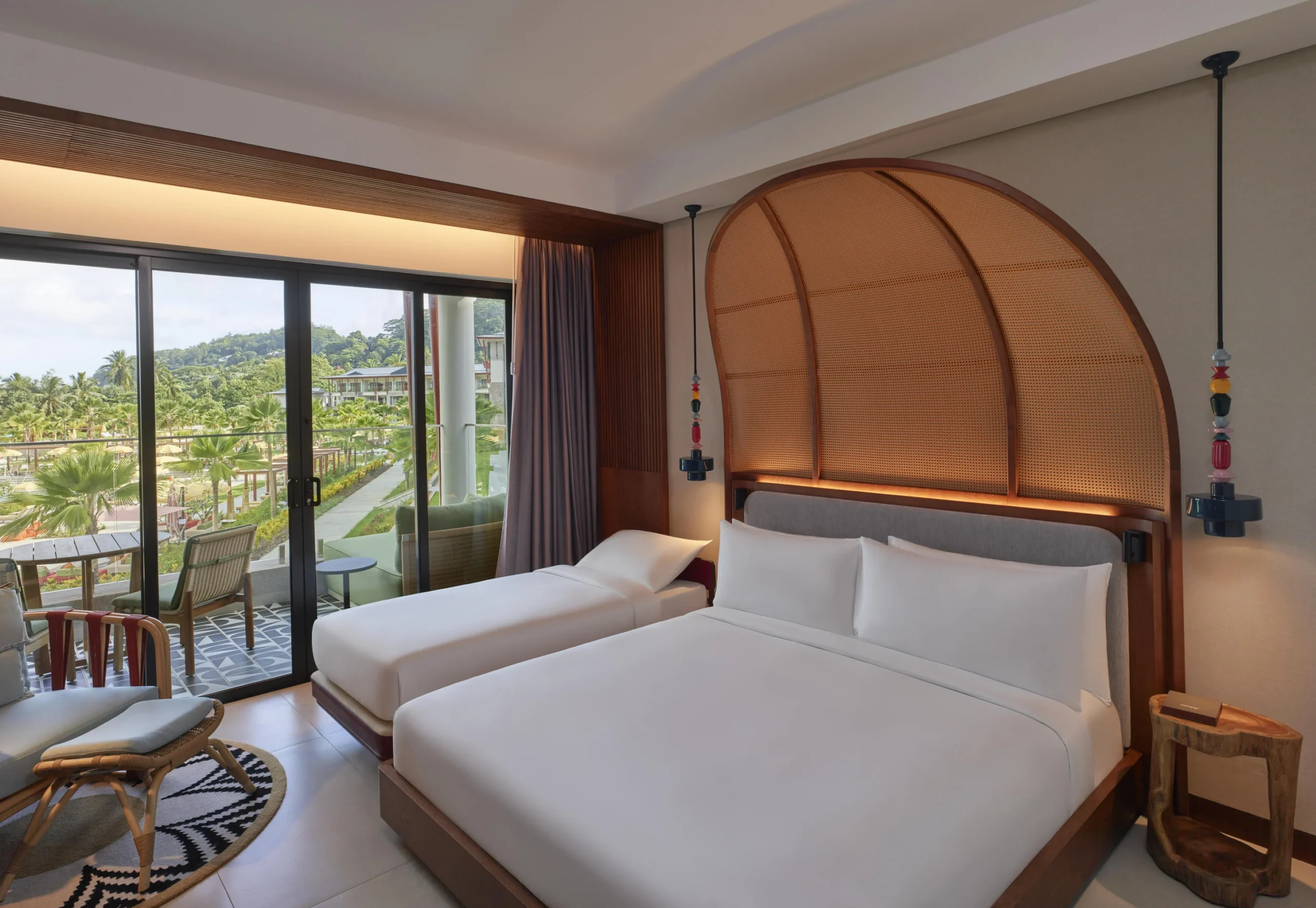 Deluxe Room with Garden View at Canopy by Hilton Seychelles Resort in Mahé, Seychelles, offering spacious accommodation, contemporary island-inspired décor and views of the resort gardens.