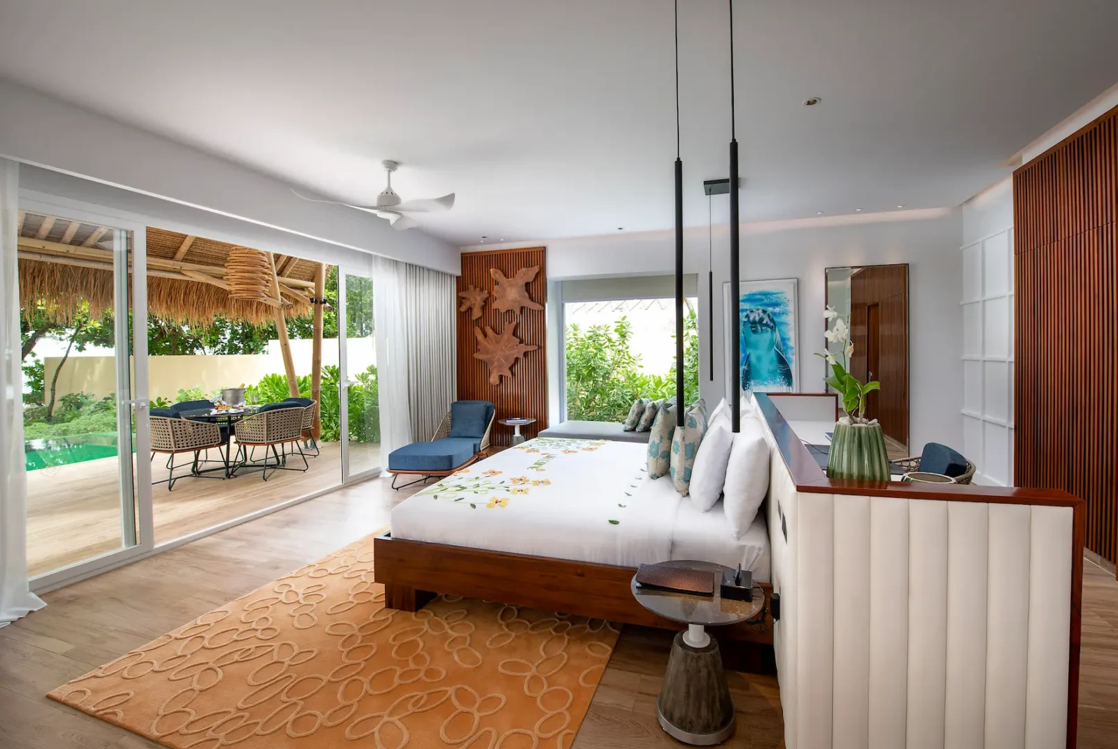 bedroom in a beach villa with pool at emerald maldives resort & spa in the maldives featuring contemporary interiors and direct access to the outdoor terrace and private pool