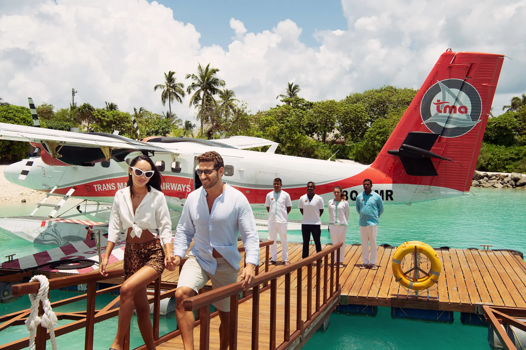 arrival experience at emerald maldives resort & spa in the maldives featuring the resort jetty, lagoon views and welcome area for arriving guests