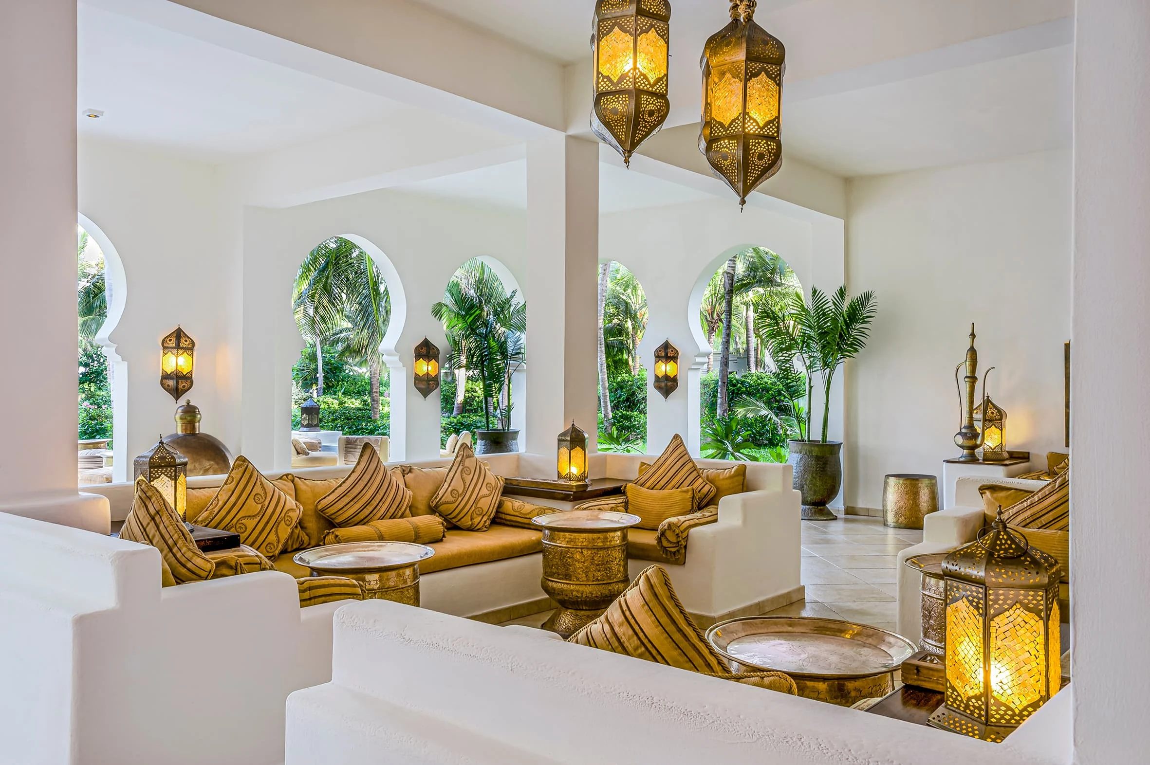 Stylish evening lounge and cocktail bar with elegant interiors inspired by Zanzibar's cultural heritage.