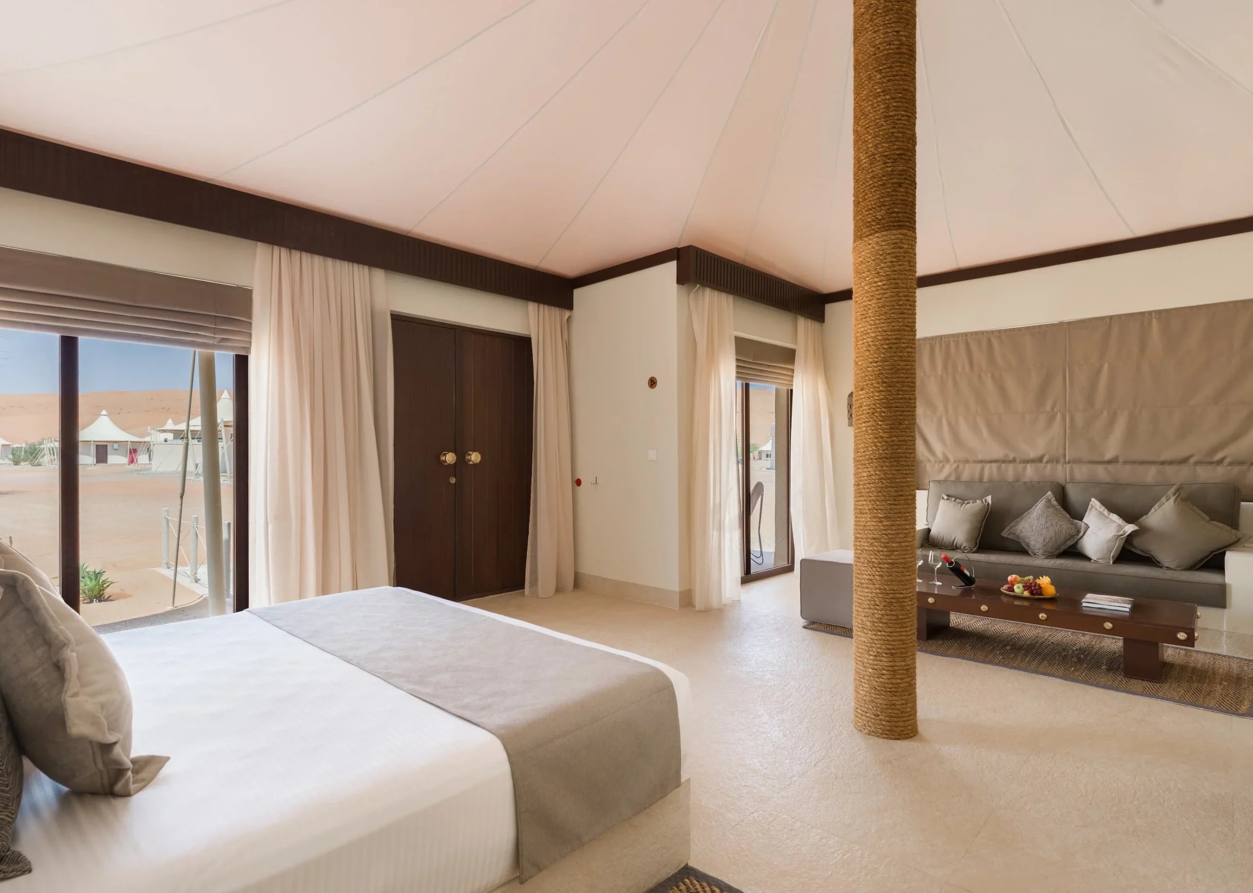 Bedroom view inside a Premier Villa at Desert Nights Resort Oman showcasing luxury accommodation in the heart of the Wahiba Sands desert