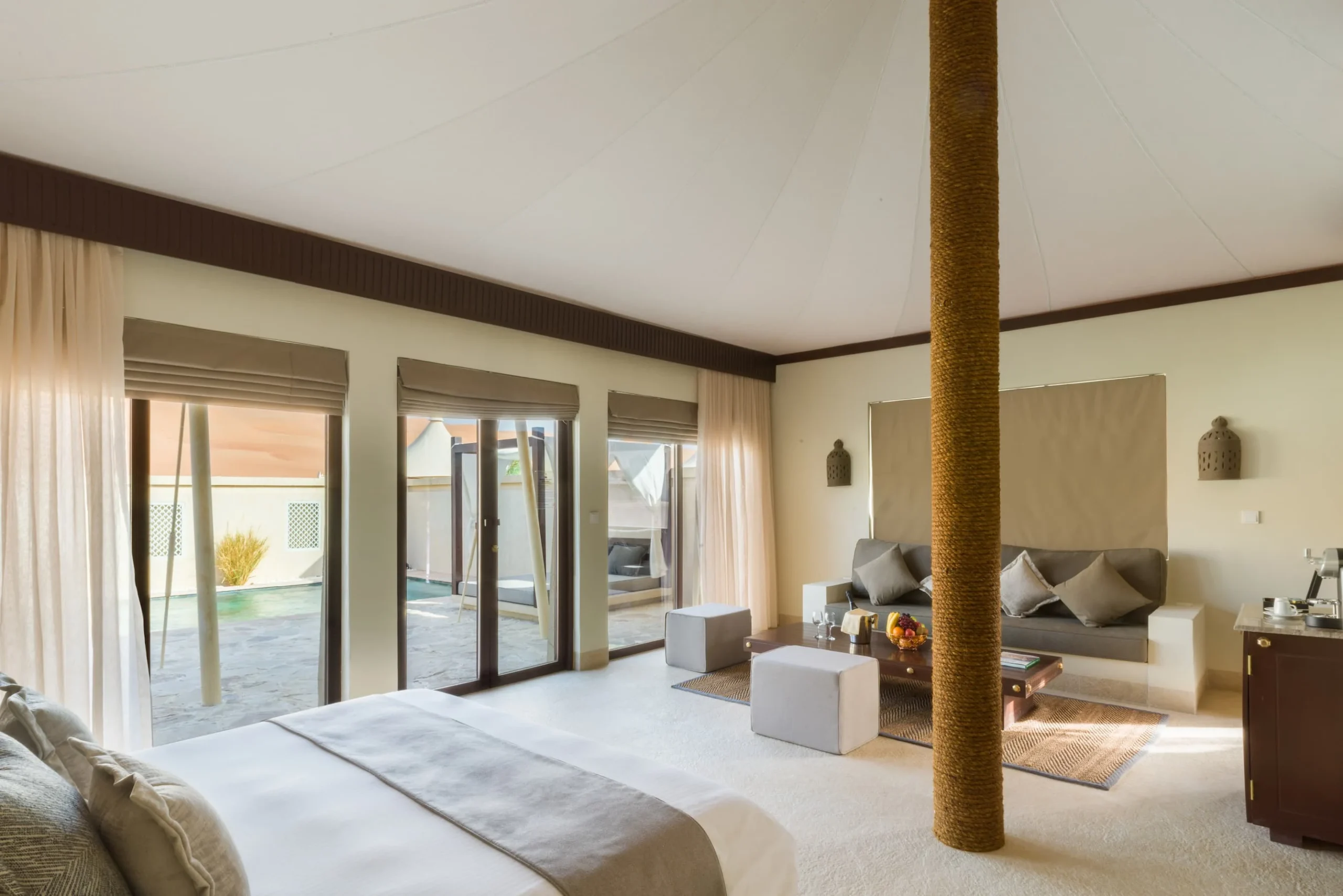 Bedroom view inside a Pool Villa at Desert Nights Resort Oman featuring luxury accommodation with private pool access in the Wahiba Sands desert