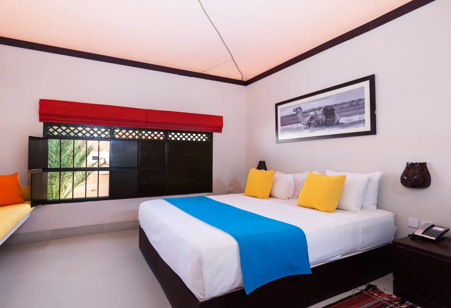 Master bedroom in a Two Bedroom Villa at Desert Nights Resort Oman featuring spacious family accommodation in the Wahiba Sands desert